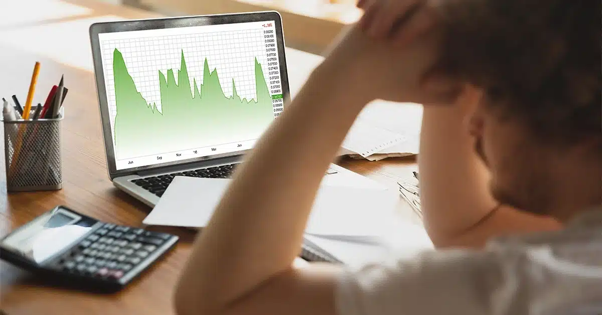 Company owner looking at a chart and analyzing encountered problems